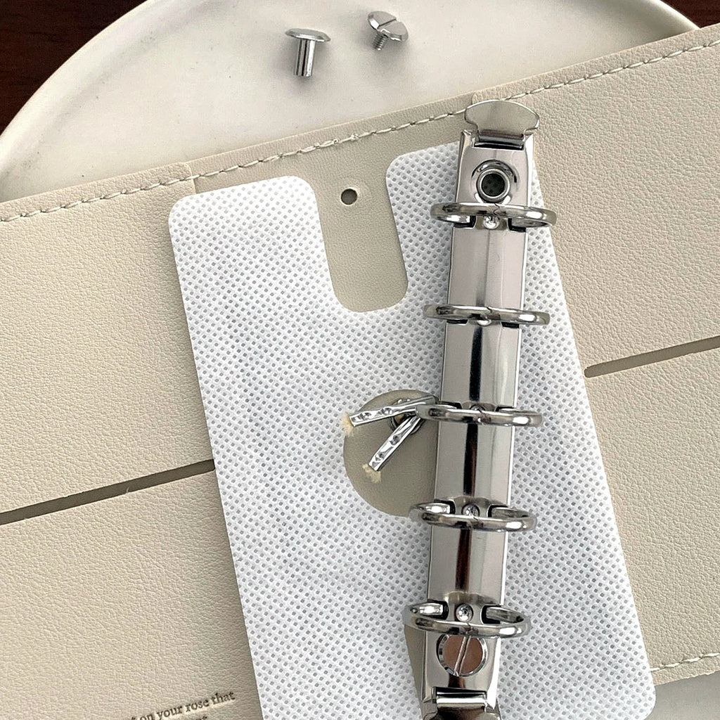 Cafe M5 Refillable Binder ring hardware detail.