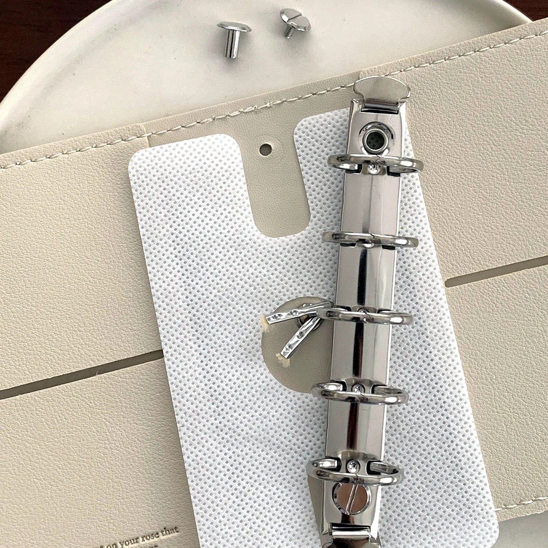 Cafe M5 Refillable Binder ring hardware detail.