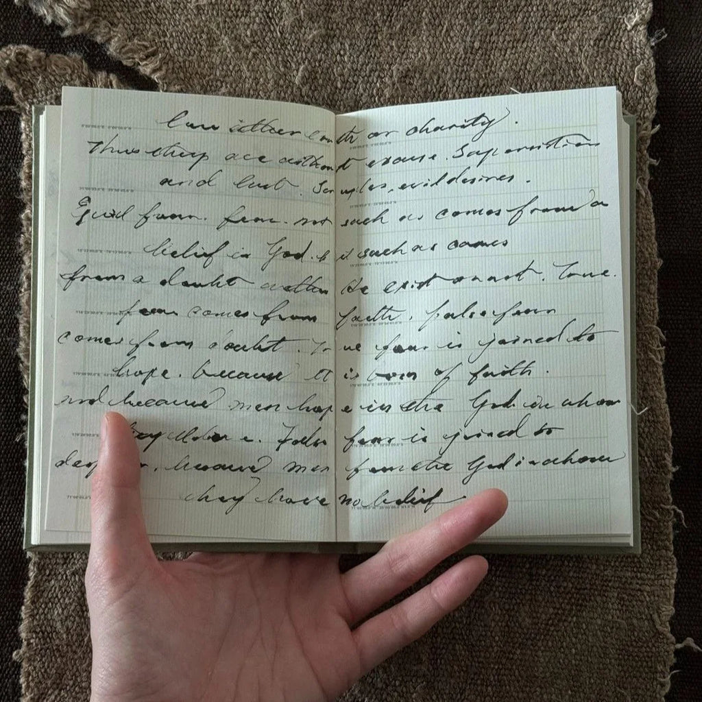 Minimal Sketch Pocket Journal opened to blank pages.