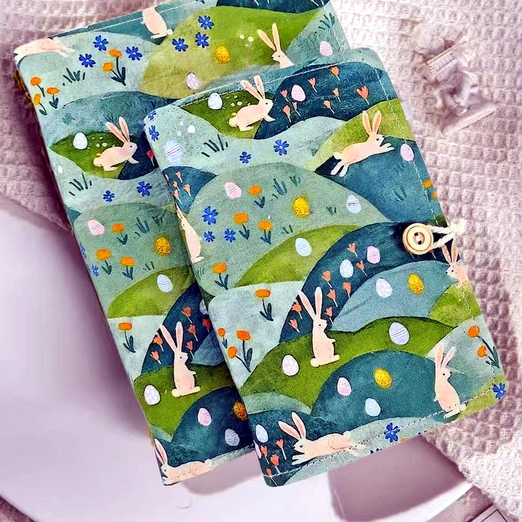 Bunny Meadow Wrap Notebook styled in a warm reading and writing setting
