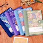 Leaf Pattern Refillable Planner Cover styled in a warm reading and writing setting