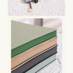 Soft Pebble A5 notebooks stacked in assorted quiet colors.